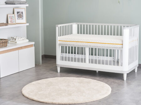 Lit bébé Minio - Un espace de sommeil confortable et sûr pour bébé